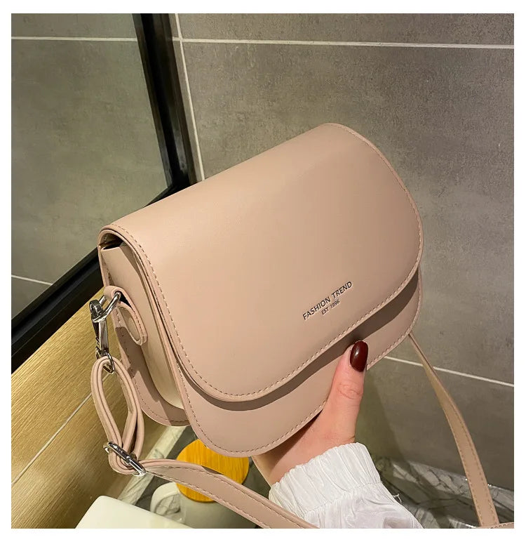 Borsa a tracolla compatta