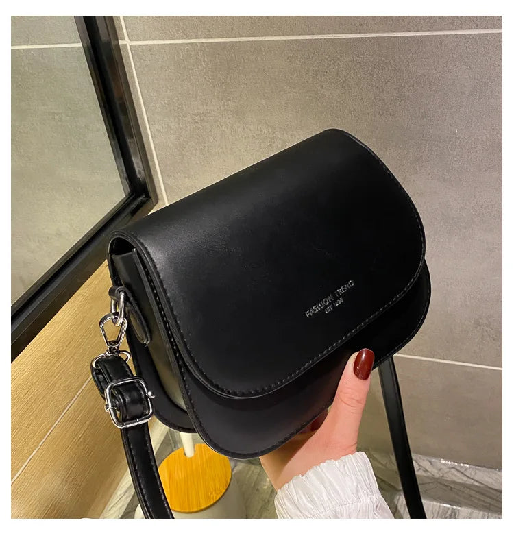 Borsa a tracolla compatta